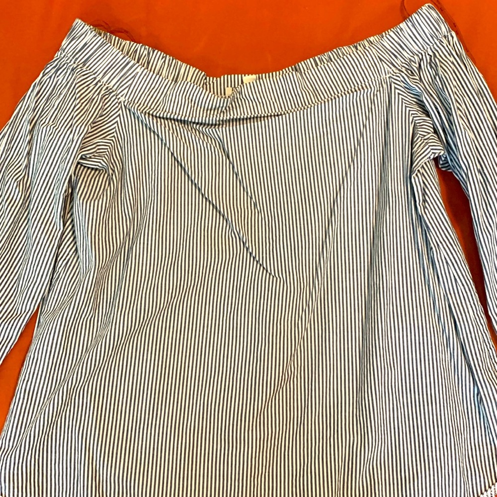 Used. Blue Striped, Shoulder Shirt. Size Medium. From Iris.